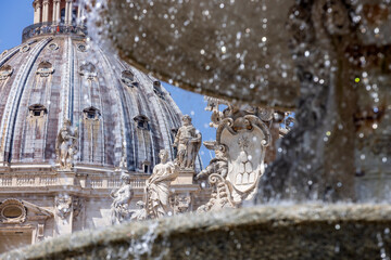 one of the two fountains on St. Peter's Square in Vatican City, created by Carlo Maderno...