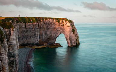 white chalk cliffs in sunrise at the sea