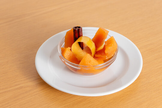 Delicious Portuguese dessert 'marmelo assado' &ndash; baked quince with cinnamon, a sweet and aromatic treat capturing local flavors.