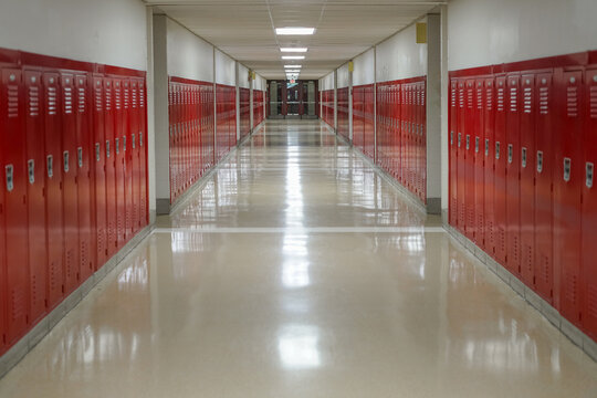 School hallway with red lockers