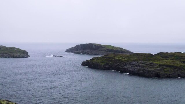 This is the Arctic. Skerries (skargard - rocky islets along a rugged coast) of north-eastern Scandinavia. The coast of the Barents Sea