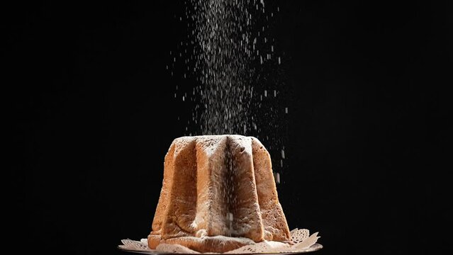 Slow Motion of a Italian christmas homemade cake. Pandoro. Italian Culture