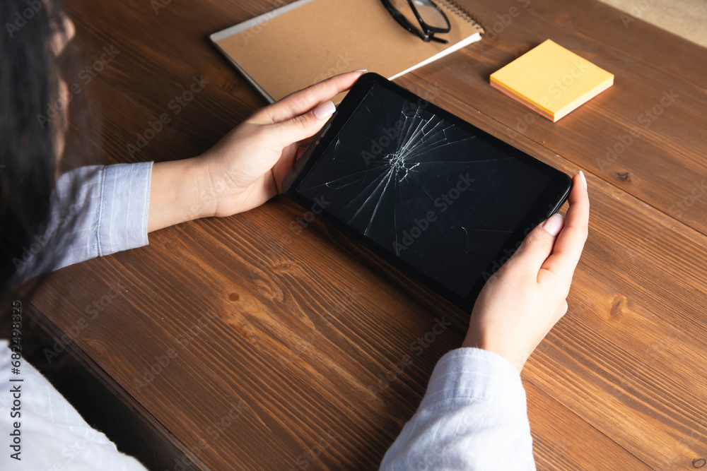 Sticker woman holding a broken tablet on her hand