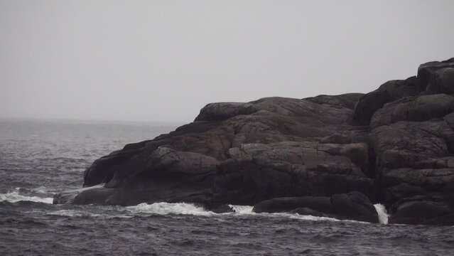 This is the Arctic. Skerries (skargard - rocky islets along a rugged coast) of north-eastern Scandinavia. The coast of the Barents Sea