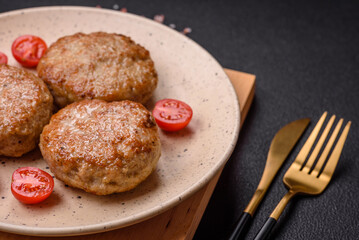 Delicious fresh fried minced fish cutlets with spices and herbs