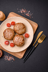 Delicious fresh fried minced fish cutlets with spices and herbs