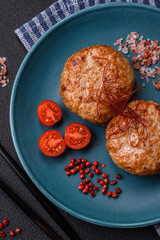 Delicious fresh fried minced fish cutlets with spices and herbs