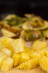 Sliced into pieces of fresh ripe peeled pineapple