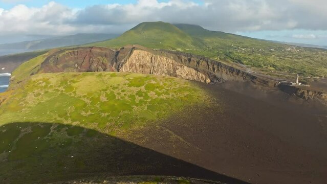 Cinematic drone shot of Capelinhos Volcano, Faial Island, Azores