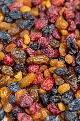 different types of dried berries on the kitchen table
