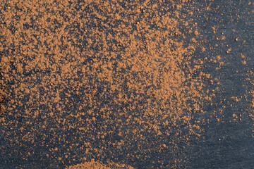 natural cocoa on a black slate board after sweets