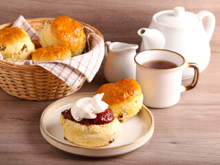 Classical scones with jam and whipped cream