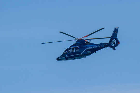 Deutschland , Rostock , 22.08.2015 ,  Ein Hubschrauber der deutschen Bundespolizei vor blauem Himmel