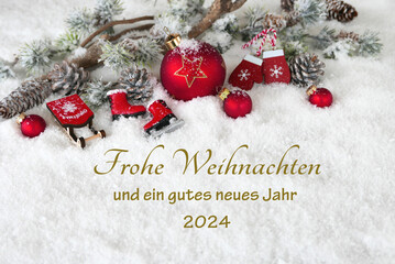 Weihnachtskarte: Rote Weihnachtskugeln mit Zweigen im Schnee und der Beschriftung Frohe Weihnachten...
