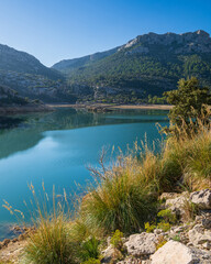 Fototapeta na wymiar A small lake, Torrent de Gorg Blau, located among the rocks in Mallorca, Spain