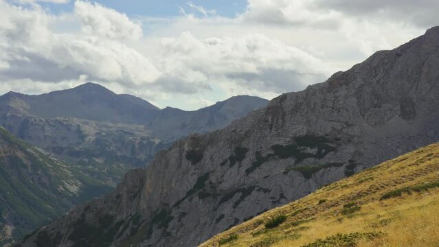 Panning over mountain peaks and ridges in Pirin National Park, Bulgaria.