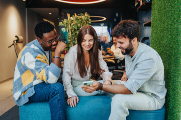 A diverse group of confident professionals collaborates in a creative co-working space.