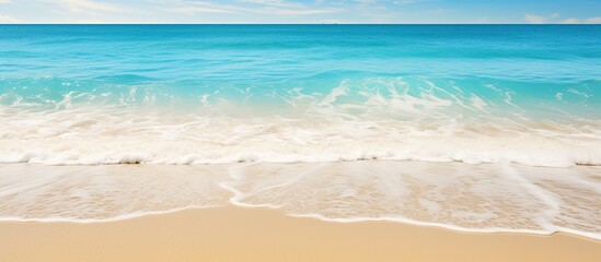 On a beautiful beach in the midst of summer, an abstract texture of water gently caresses the soft sand, as travelers revel in the concept of tranquility and relaxation, indulging in a refreshing hand