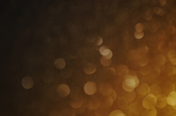 Fondo naranja amarillo con luces efecto bokeh ideal para diseño de navidad/fin de...