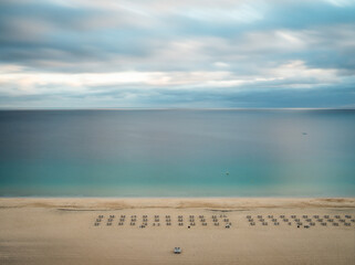Beautiful turquoise sea and sandy beach from the top - long exposure