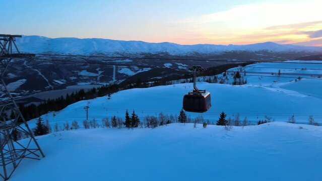 Sunset in wintery Voss - smooth following after chairlift at Norwegians ski resort