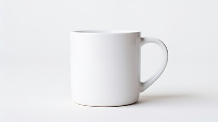 A close-up of a white coffee mug against a solid white backdrop.
