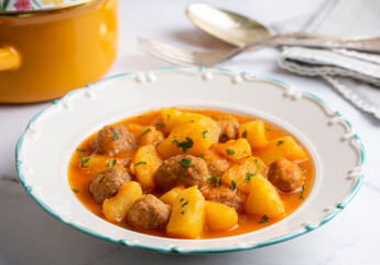 Potato dish with meatballs, Turkish name; koftleli sulu patates yemegi