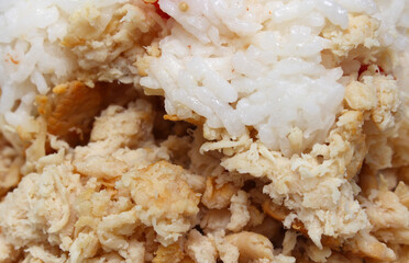 Rice with chicken. white meat with rice. meal details. Cooked chicken texture. food with selective focus.
