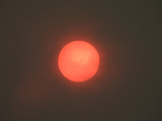 Bloody sun on wildfire day