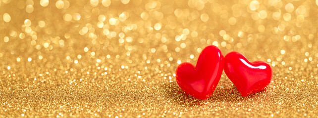 red hearts on gold bokeh background