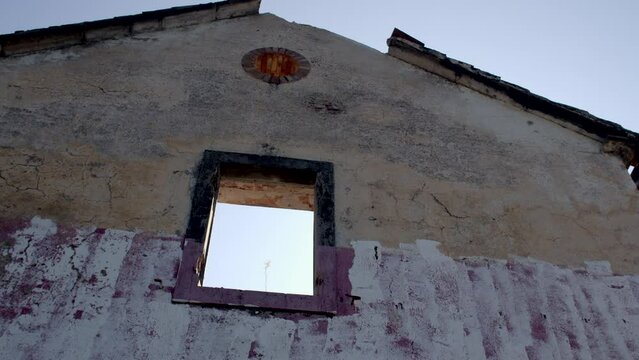 Sun light against the backdrop of destruction. Sunlight streaming through the windows of a ruined building conveys themes of hope, renewal, and resilience. 