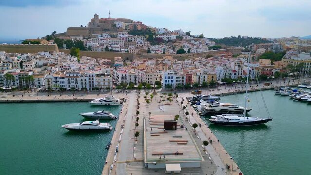 Mooring aerial top view flight drone. Ibiza Town old City Harbor Port promenade