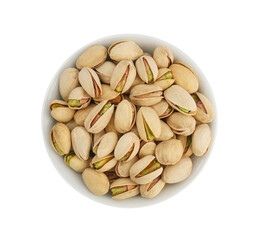 Bowl or dish of raw organic pistachios that are salted and roasted on a white background