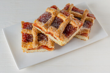 Argentine quince cake on a white tray.