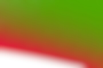 Abstract blurred background image of green, red colors gradient used as an illustration. Designing posters or advertisements.