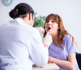 Young patient visiting doctor otolaryngologist