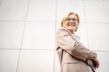 portrait of one caucasian mature woman female businesswoman outdoor