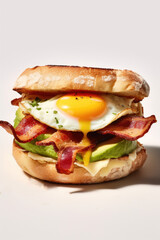 Delicious sandwich with fried eggs, bacon and avocado. Healthy breakfasts. Menu