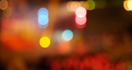 Colorful Bokeh abstract blurred background music festival stage show performance party. Vibrant...
