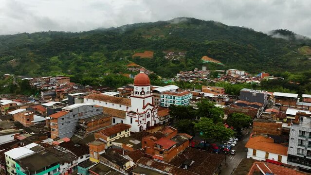 Aerial view orbiting the Iglesia de San Rafael Arcángel in San Rafael, Colombia