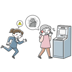電話しながらATMに向かうシニア女性と駆け寄る銀行員