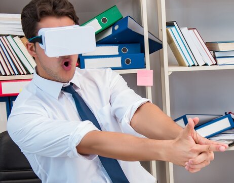 Employee watching movie on vr virtual reality glasses