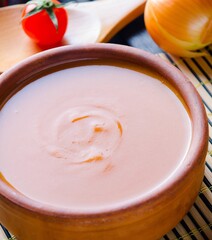 Pumpkin soup served on the table in bowl