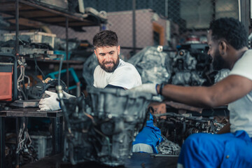 Car technician check engines, choose quality gear for precise repairs to ensure optimal performance