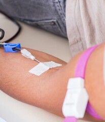 Patient getting blood transfusion in hospital clinic