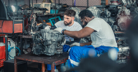 Car technician check engines, choose quality gear for precise repairs to ensure optimal performance