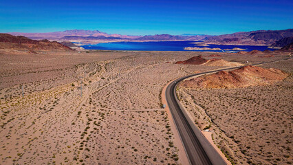 Lonesome road through the desert from above aerial view - aerial photography