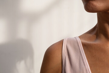 Female shoulder and neck. Sunburn body.