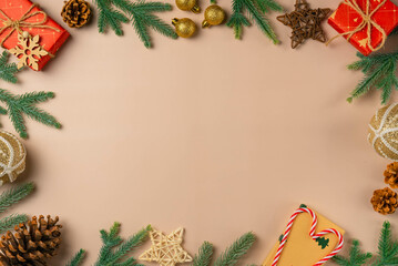 Fototapeta na wymiar Christmas frame on beige background