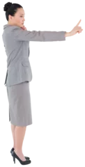 Deurstickers Aziatische plekken Digital png photo of focused asian businesswoman pointing with finger on transparent background